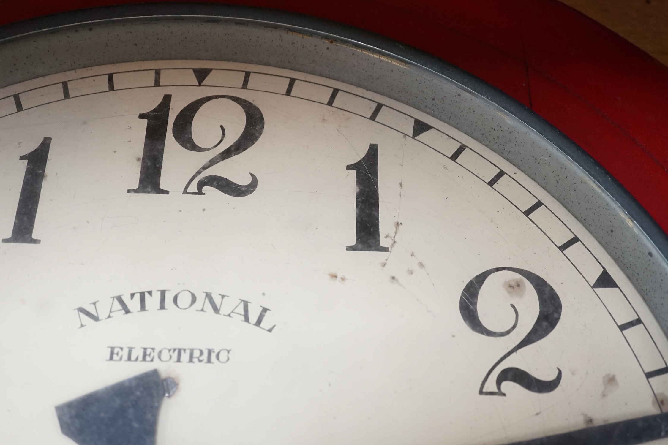 A vintage National Electric wall clock, 66cm in diameter. Condition - poor to fair